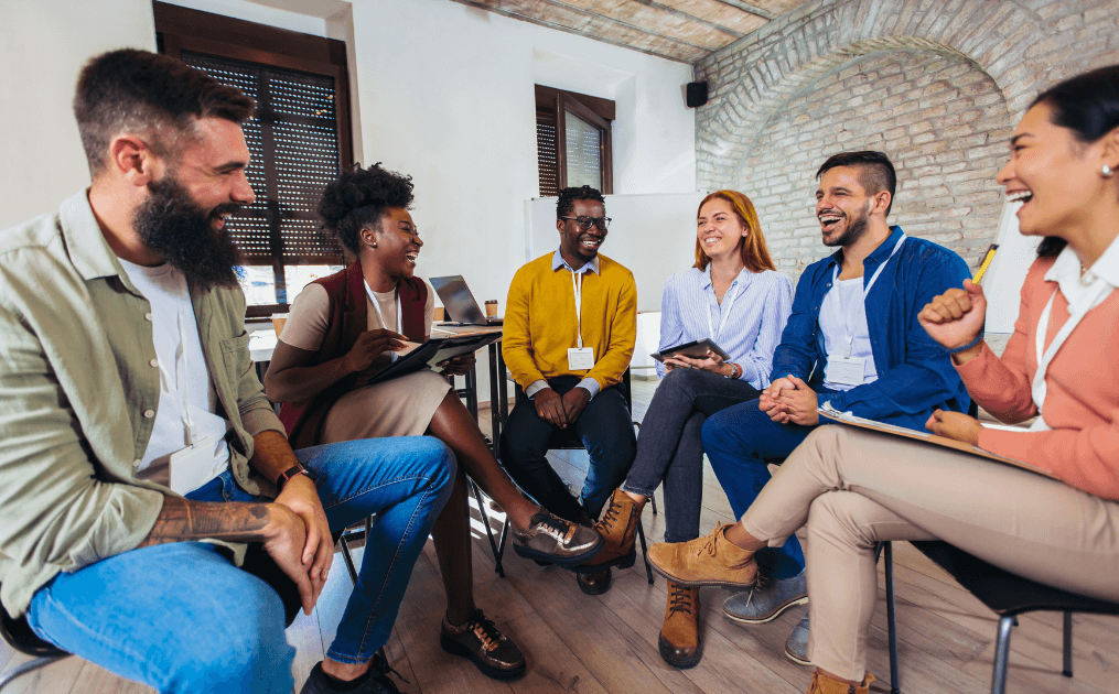 A group of employees engaging at a meeting