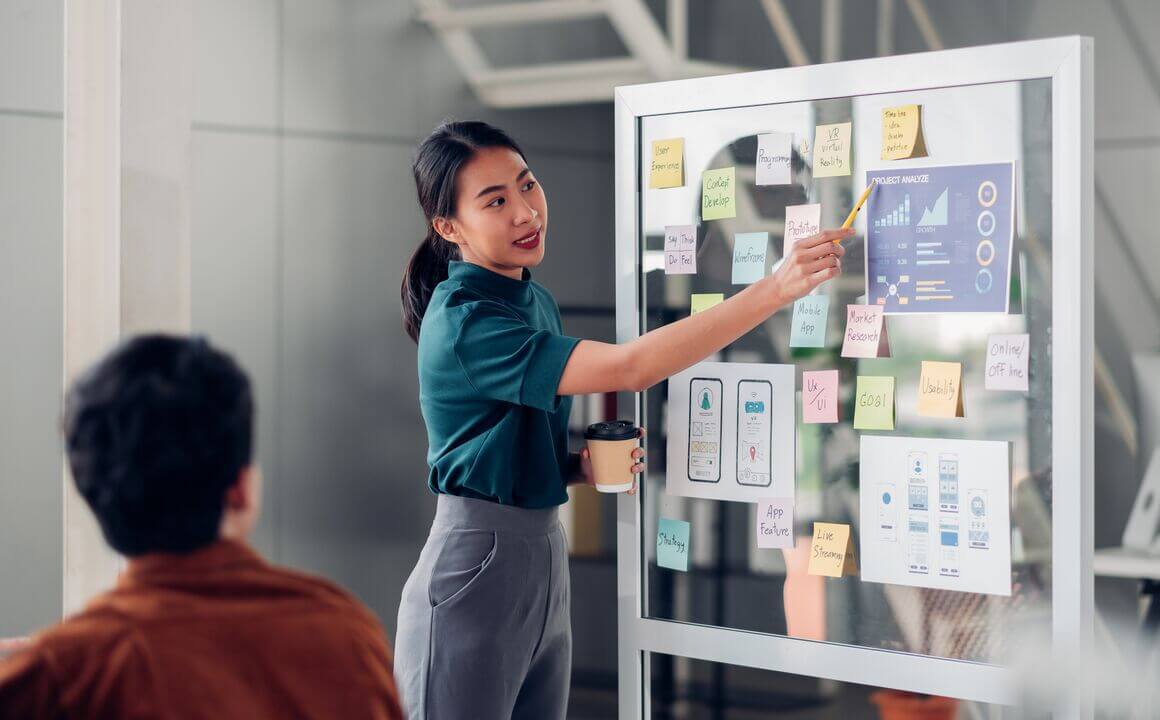 A woman having a board meeting with colleagues