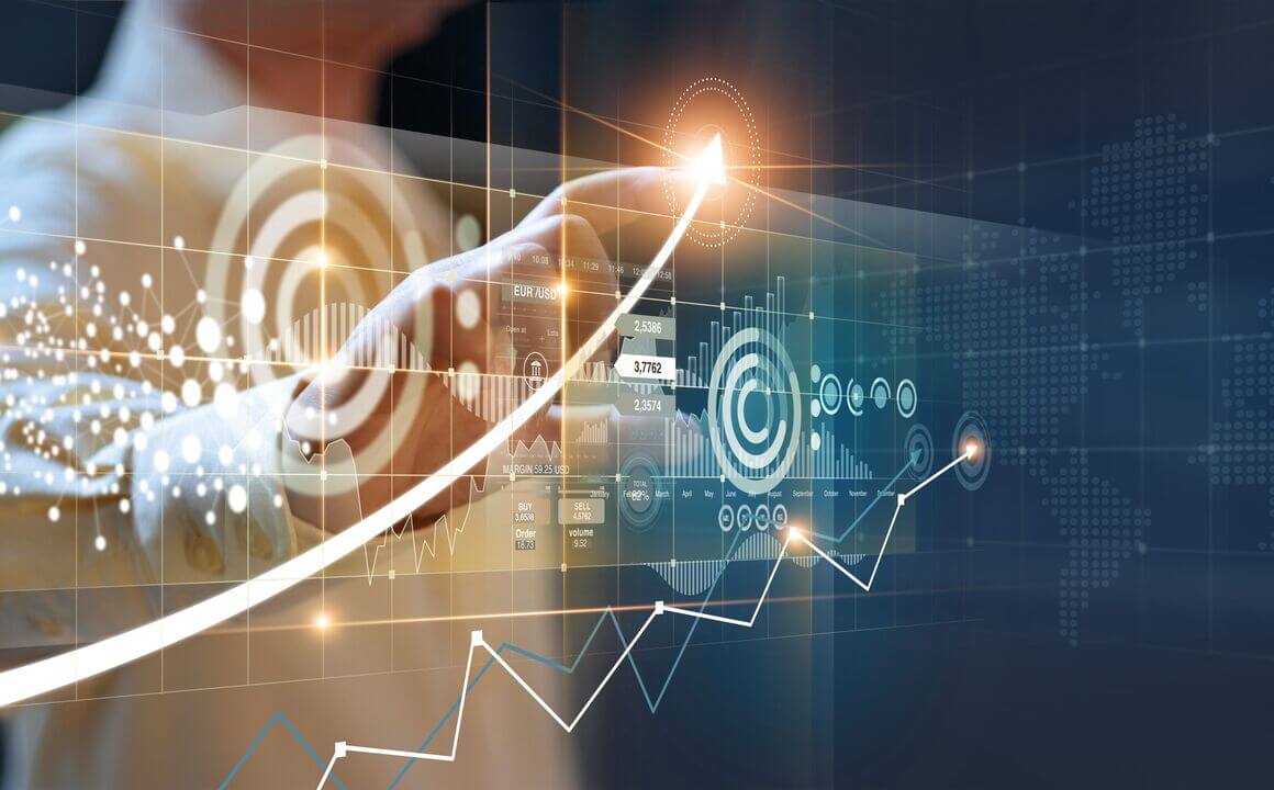 A person using a touch screen to show growth in analytics